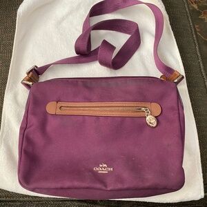 Clean Coach Purple Canvas Crossbody. See pictures for dimensions. COA